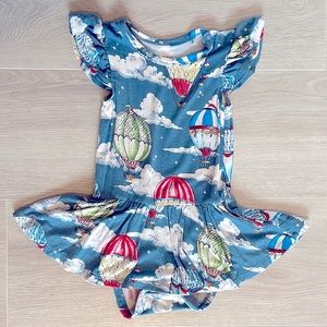 Posh Peanut Skirted Bodysuit